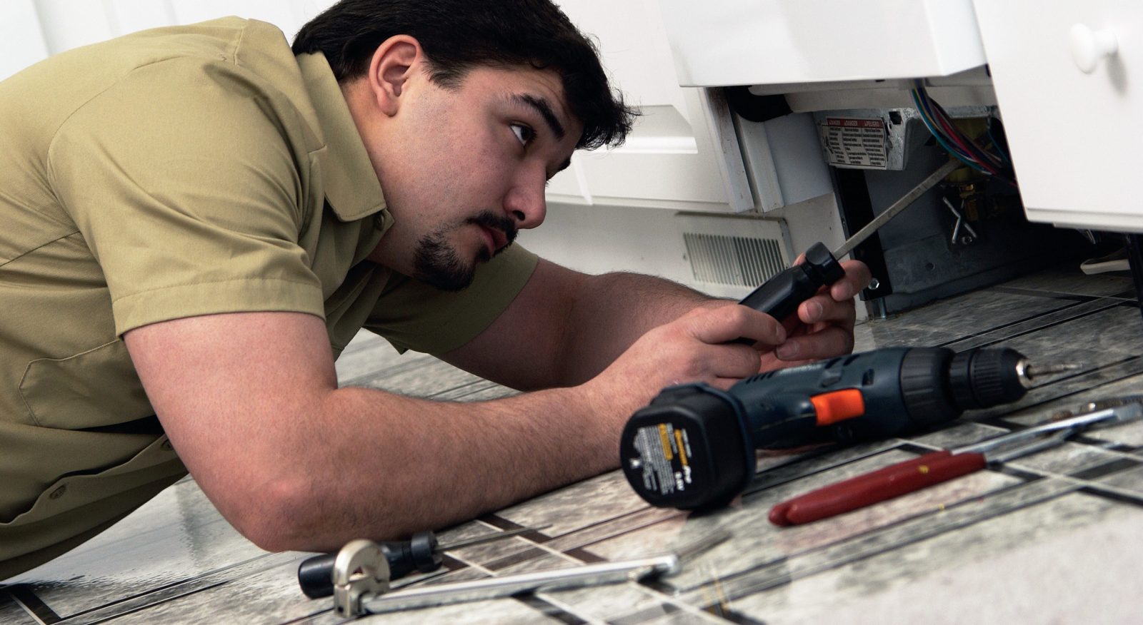 When it is Time to Skip the DIY and Call a Pro Appliance Cowboys